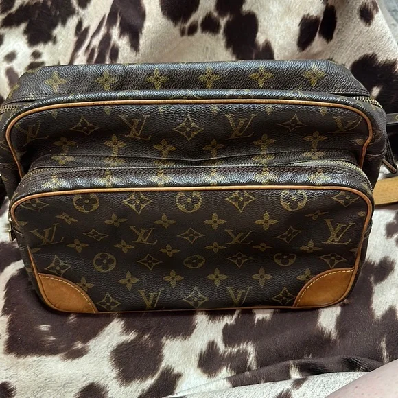 Louis Vuitton Nile - Picture 1 of 9
